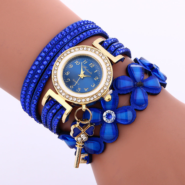 Montre bracelet en strass en cristal doré