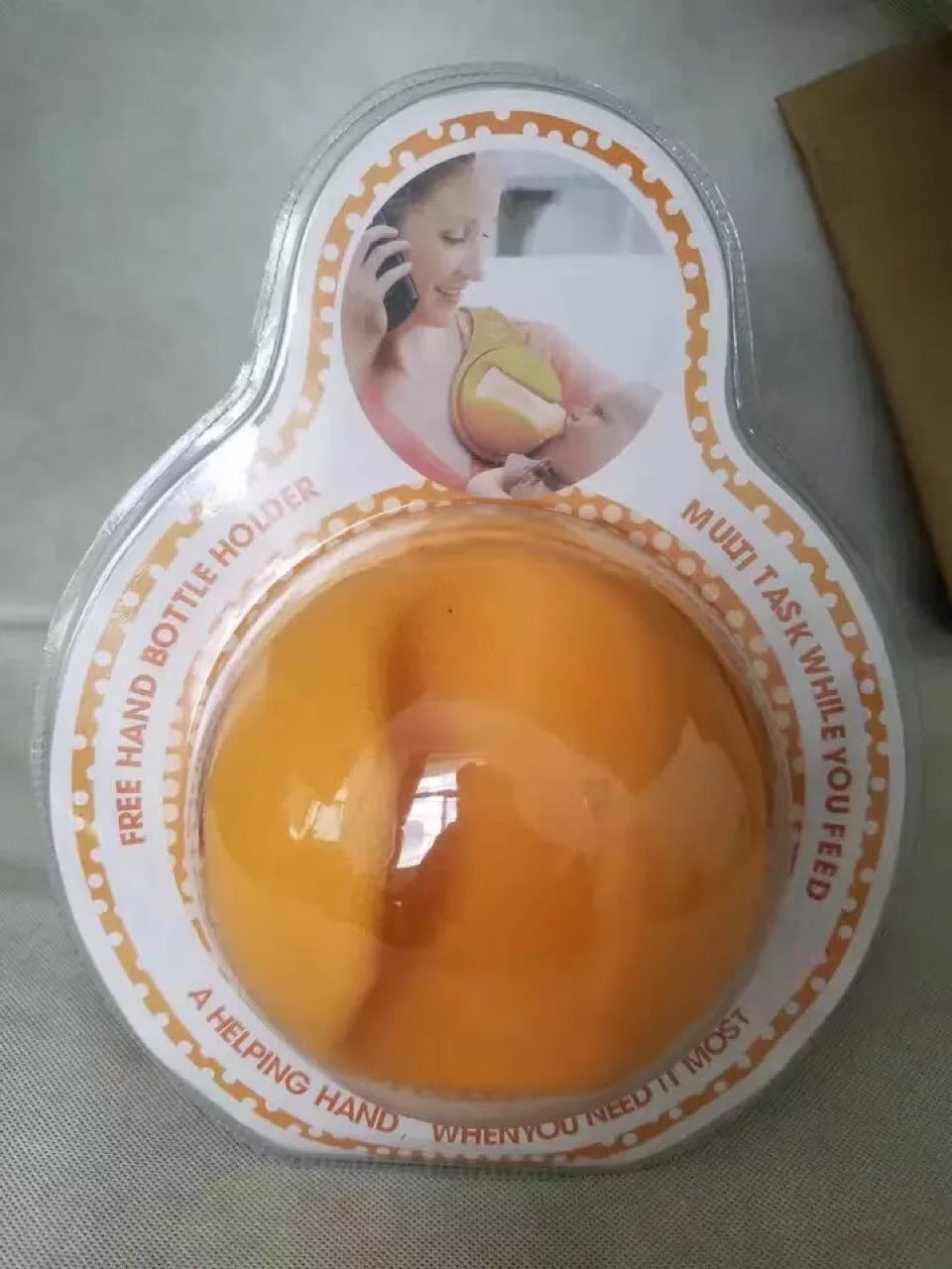Porte-biberon Le moyen mains libres de nourrir votre bébé