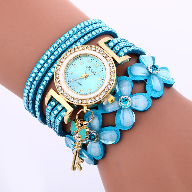Montre bracelet en strass en cristal doré